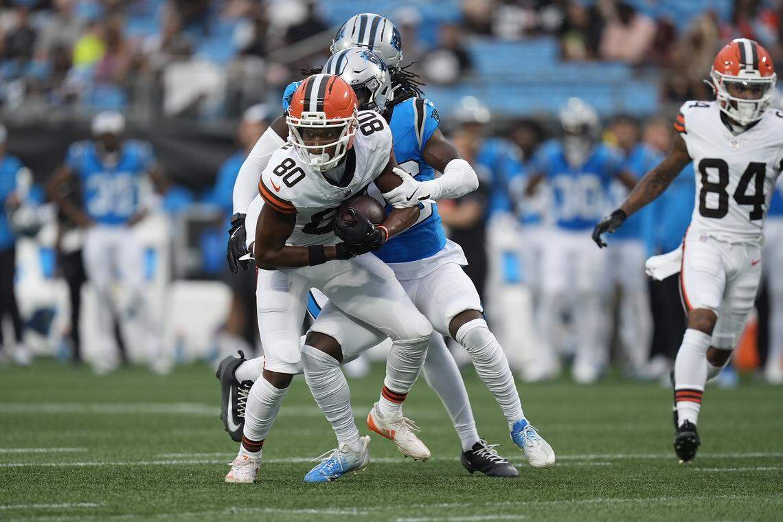 Cleveland Browns wide receiver Jamari Thrash (80) is tackled after the completion by Carolina Panthers safety Demani Richardson (36) during Friday’s first quarter at Bank of America Stadium. 