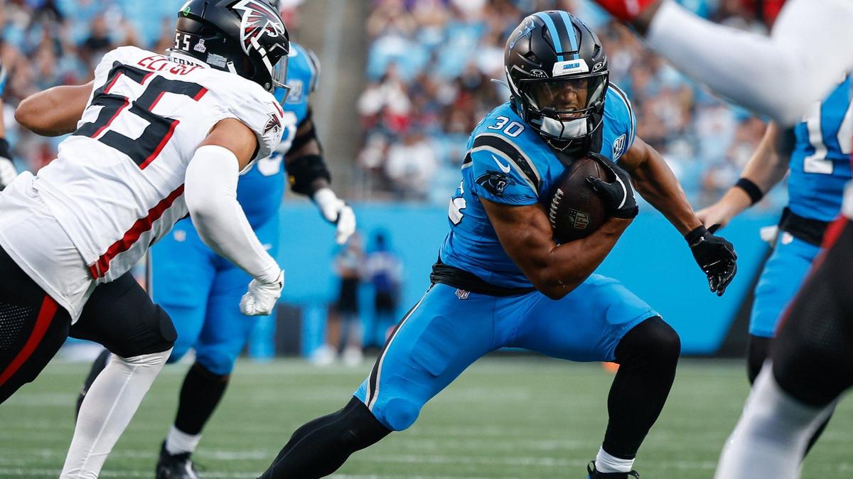 Panthers runningback Chuba Hubbard runs the ball during the game against the Falcons at Bank of America Stadium in Charlotte, NC on Sunday, Oct. 13, 2024.