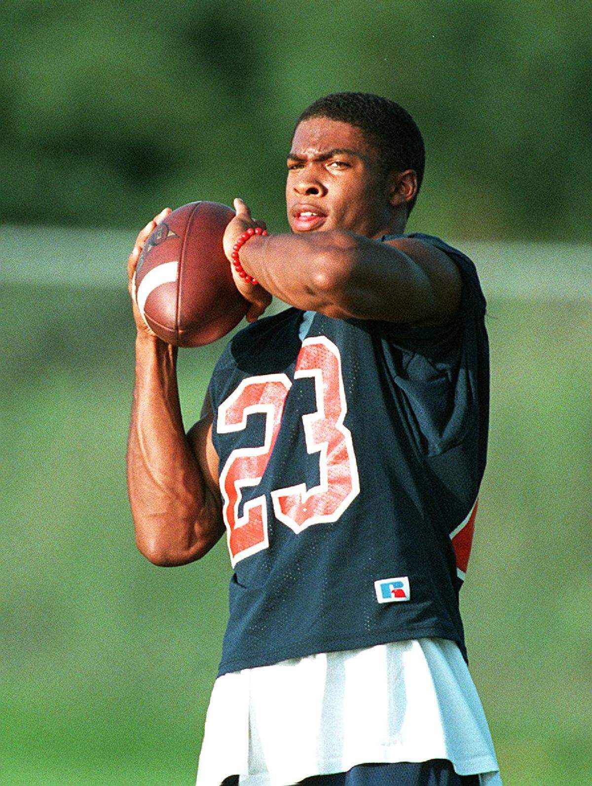 Robert Boulware warms up before a football scrimmage in 2000.
