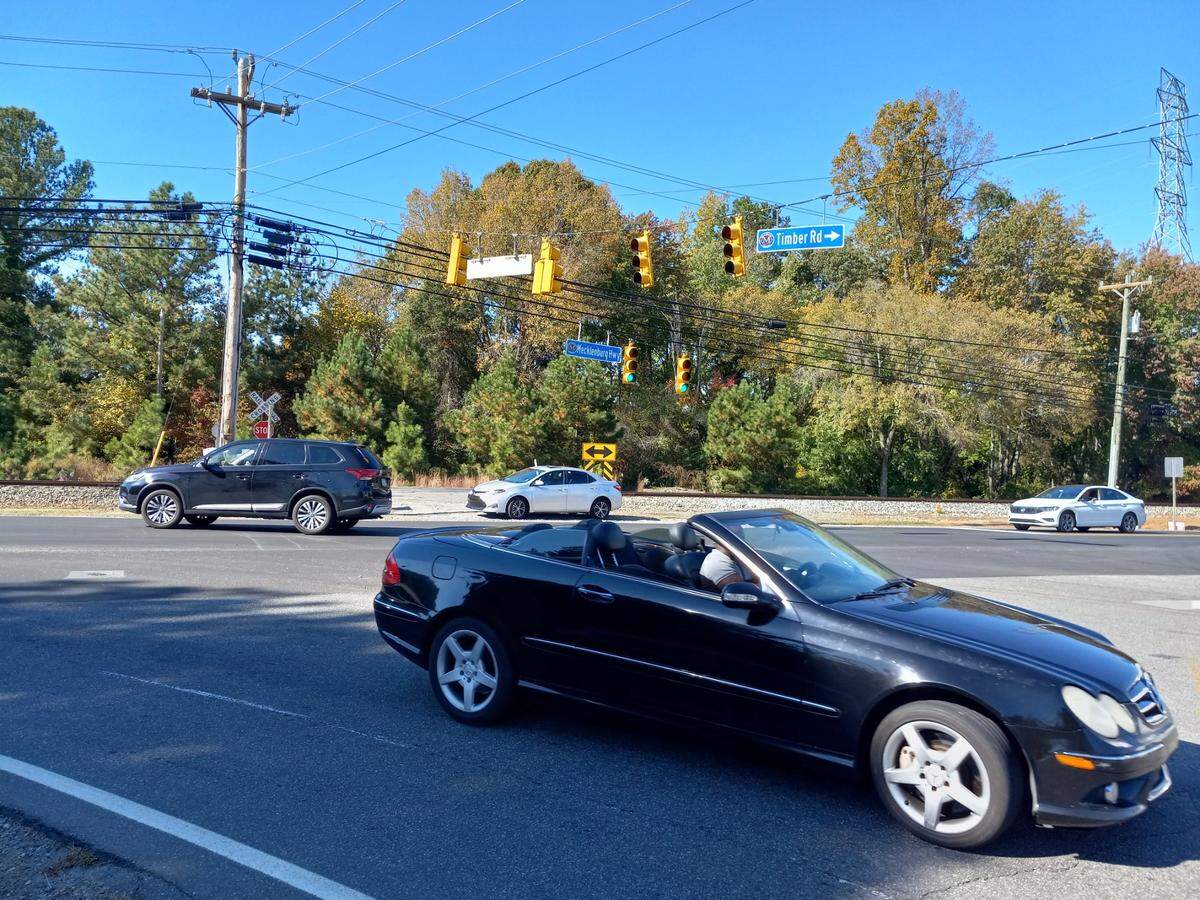 A driver turns onto Timber Road from Mecklenburg Highway (N.C. 115 North) in Mooresville on Tuesday, Oct. 24, 2022.