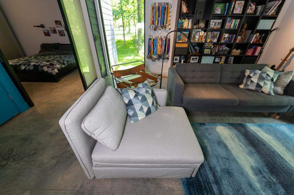 Modern furniture compliments the design of the home.