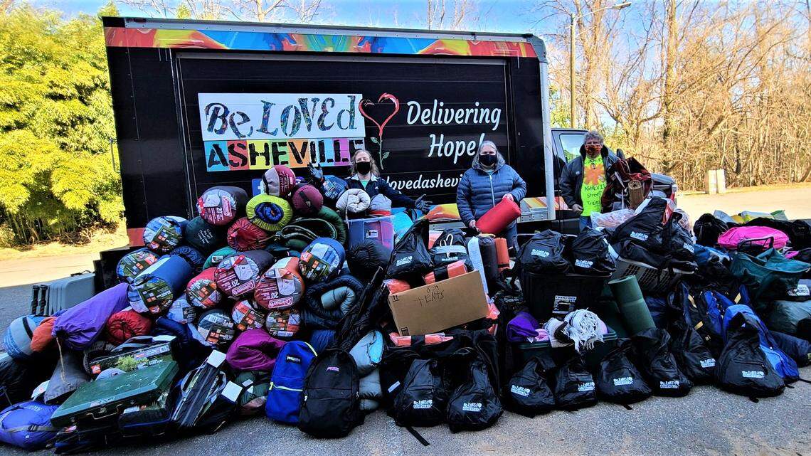 The street medic team at BeLoved Asheville trains people who are currently or formerly unsheltered in basic medical skills like first aid, wound care and overdose prevention. They also distribute flyers about the covid vaccines and ask people if they’ll pledge to get their shots. (Ponkho Bermejo)