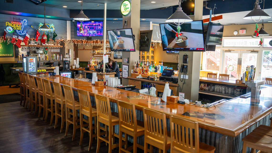 Save water, drink cocktails. Here’s the best bar in Charlotte, according to readers.