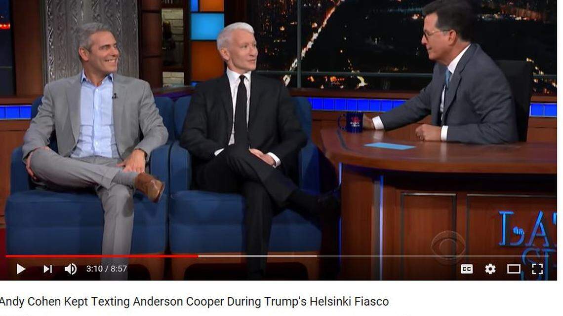 Andy Cohen, left, and Anderson Cooper, center, appear on The Late Show With Stephen Colbert.