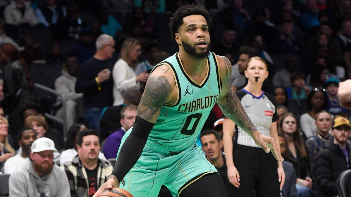 Charlotte Hornets forward Miles Bridges (0) drives in during the first half against the Chicago Bulls at the Spectrum Center. Sam Sharpe-Imagn Images