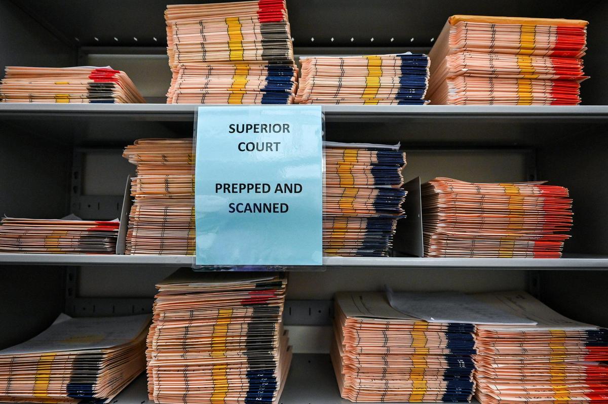 Scanned cases for Mecklenburg County Superior Court sit on a shelf in the Criminal Division of the clerk’s office.