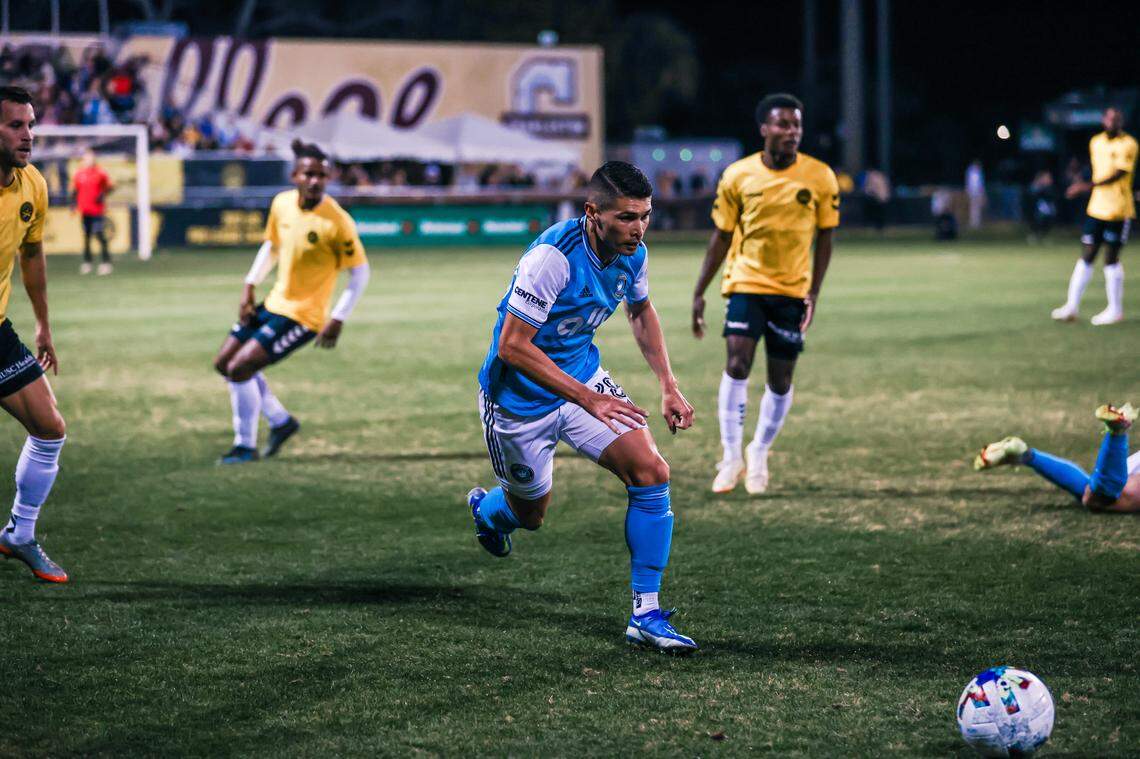 Charlotte FC defender Joseph Mora dribbles the ball during a Carolina Challenge Cup pre-season match in Charleston, South Carolina.