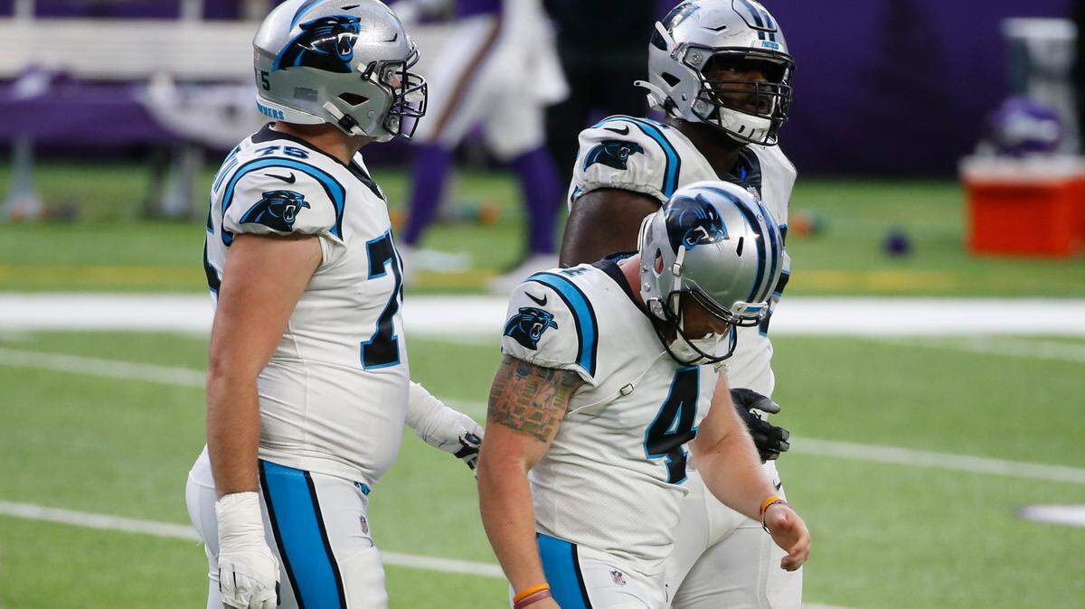 Carolina Panthers place kicker Joey Slye (4) walks off the field after missing a field goal at the end of an NFL football game against the Minnesota Vikings, Sunday, Nov. 29, 2020, in Minneapolis. The Vikings won 28-27. (AP Photo/Bruce Kluckhohn)
