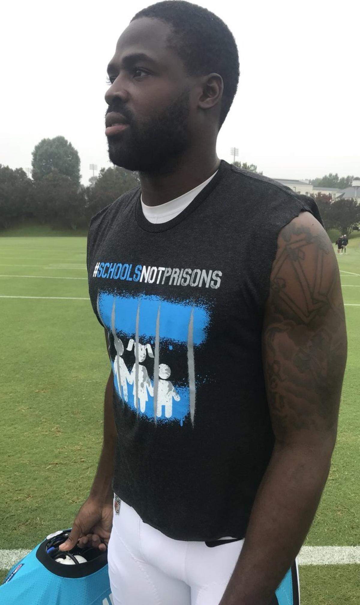 Carolina Panthers wide receiver Torrey Smith wore a T-shirt to practice on Wednesday with the hashtag #SchoolsNotPrisons, part of a Players Coalition effort to change the league’s social justice narrative.