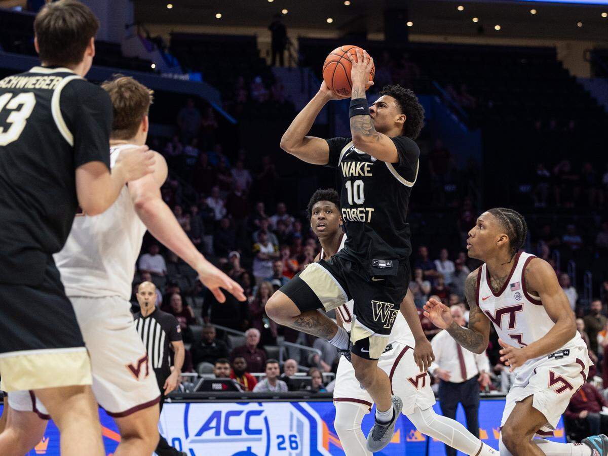 Wake Forest Demon Deacons guard Sebastian Akins shoots against the Virginia Tech Hokies during the ACC men's basketball tournament in Charlotte, N.C., on Tuesday, March 10, 2026.
