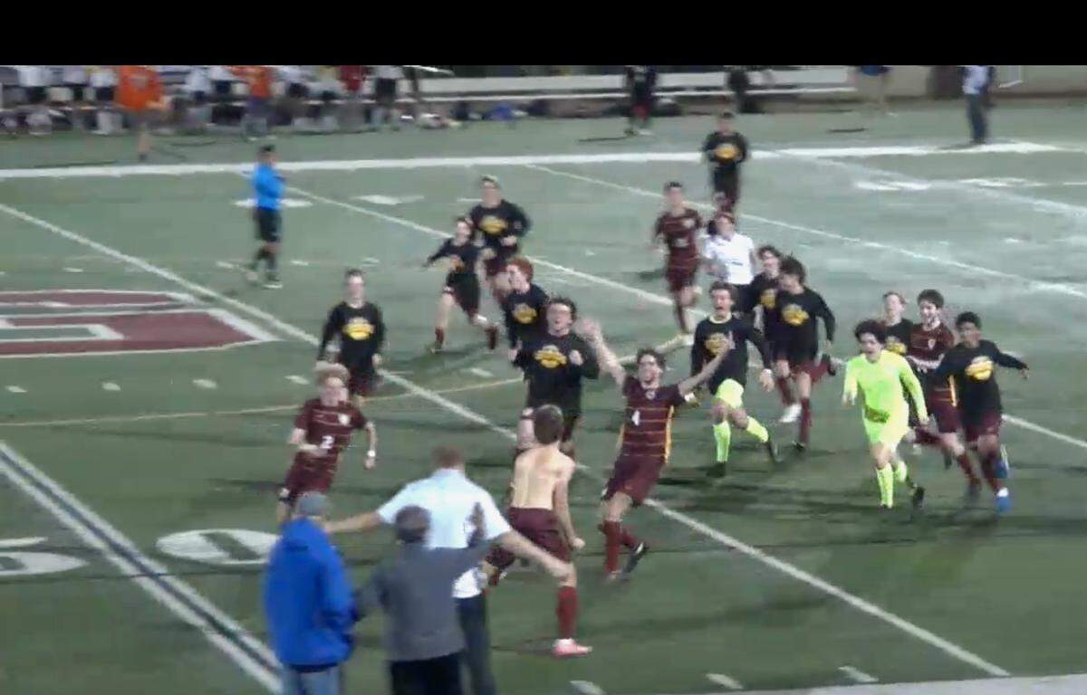 Thomas Jefferson players celebrate winning Thursday’s 1A state final.