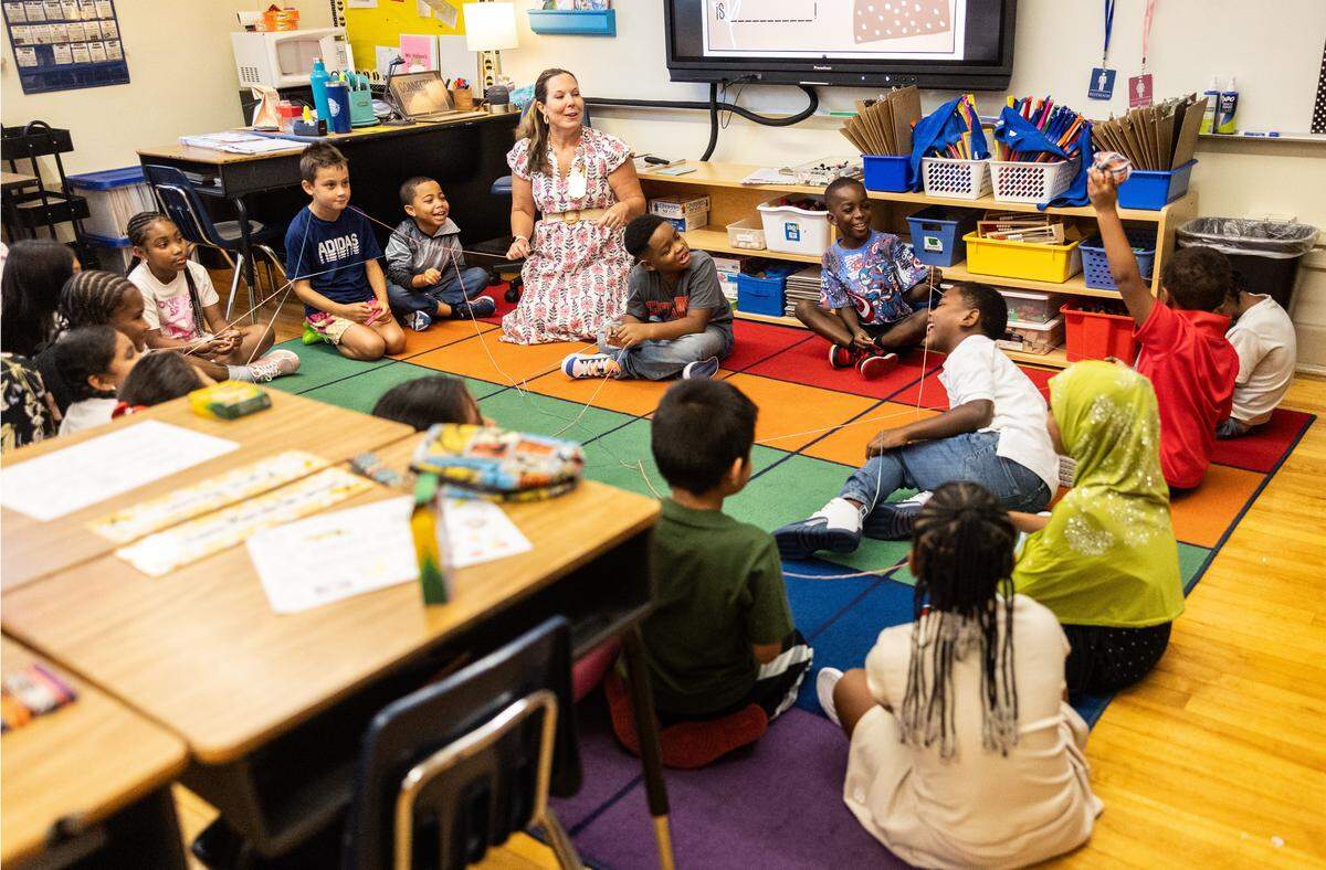 CMS Superintendent Dr. Crystal Hill visits a classroom during the first day of school at Elizabeth Traditional School in Charlotte, N.C., on Monday, August 25, 2025.