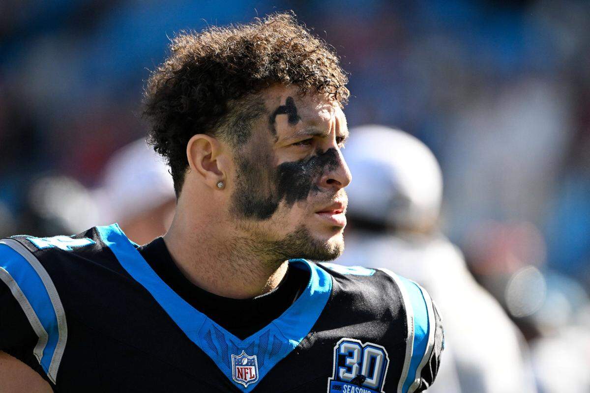Nov 24, 2024; Charlotte, North Carolina, USA; Carolina Panthers tight end Feleipe Franks (84) on the sidelines in the second quarter at Bank of America Stadium. Mandatory Credit: Bob Donnan-Imagn Images