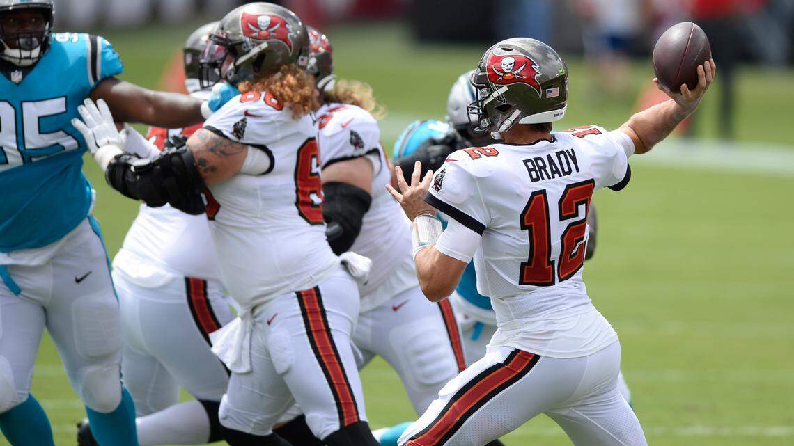 Tampa Bay Buccaneers quarterback Tom Brady (12) throws a pass against the Carolina Panthers during the first half of an NFL football game Sunday, Sept. 20, 2020, in Tampa, Fla. (AP Photo/Jason Behnken)