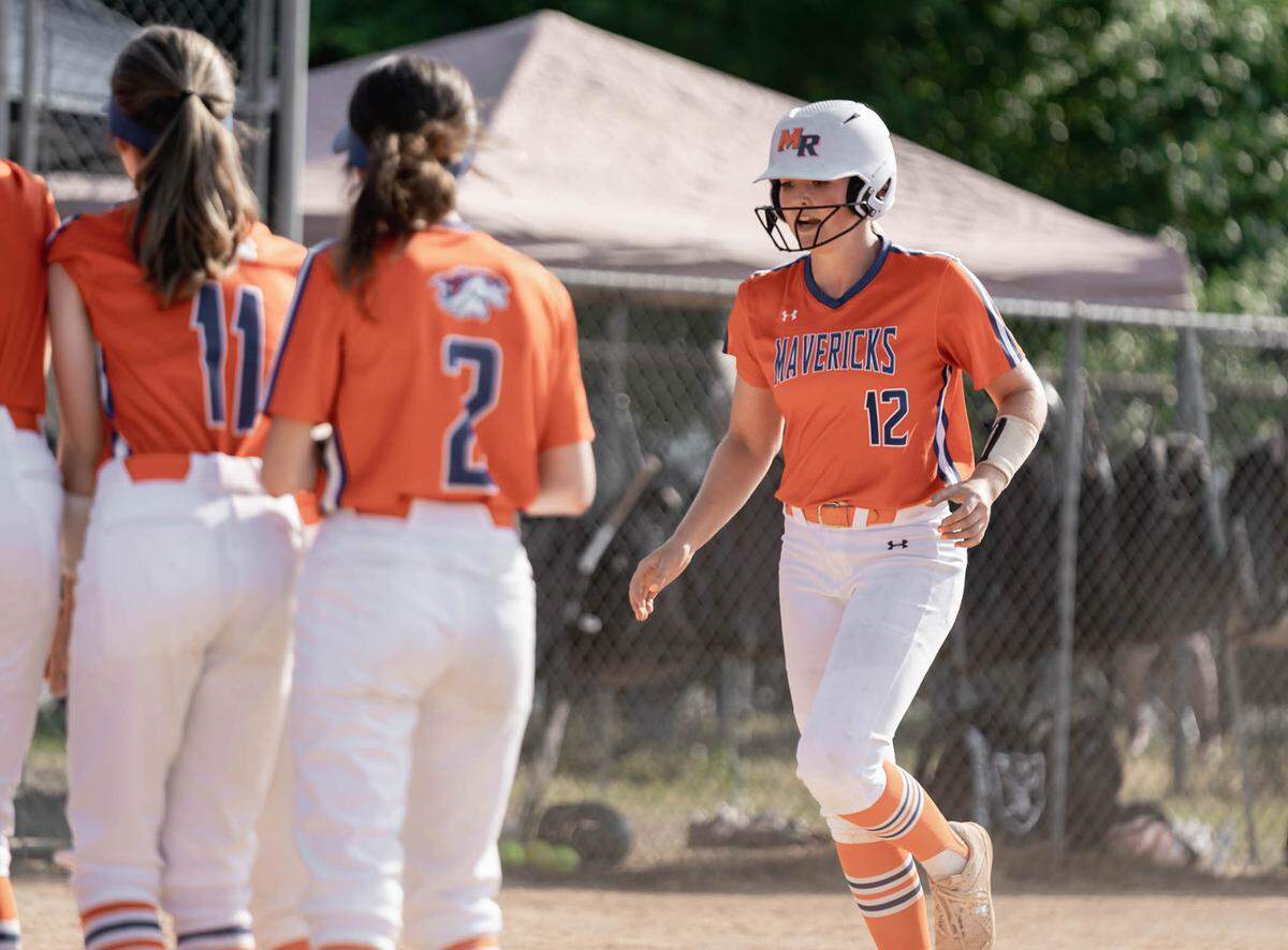 Marvin Ridge Anna Mcgowan (12) trots to home plate after her two run homerun. South Meck would host Marvin Ridge in the 4th round Women’s Softball high school playoffs Friday May 20, 2022.