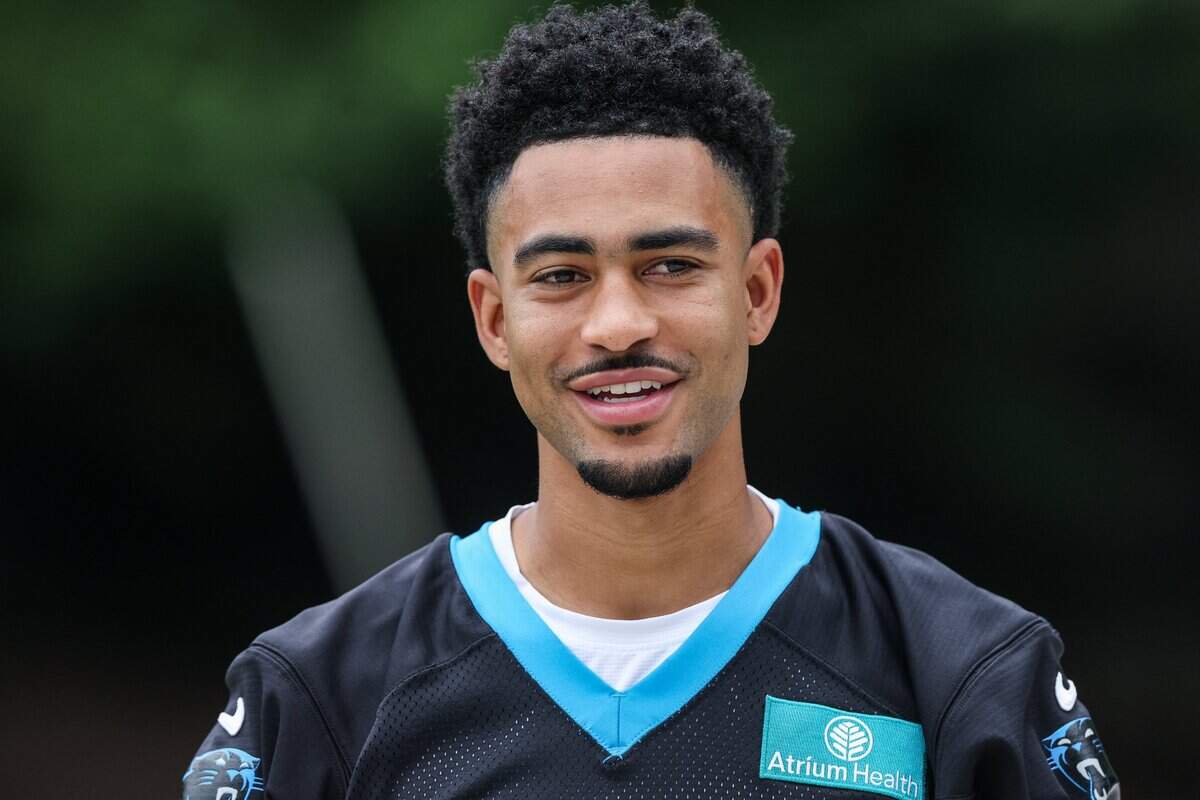 Panthers quarterback Bryce Young heads to the practice field for mandatory minicamp in Charlotte on Tuesday, June 9, 2026