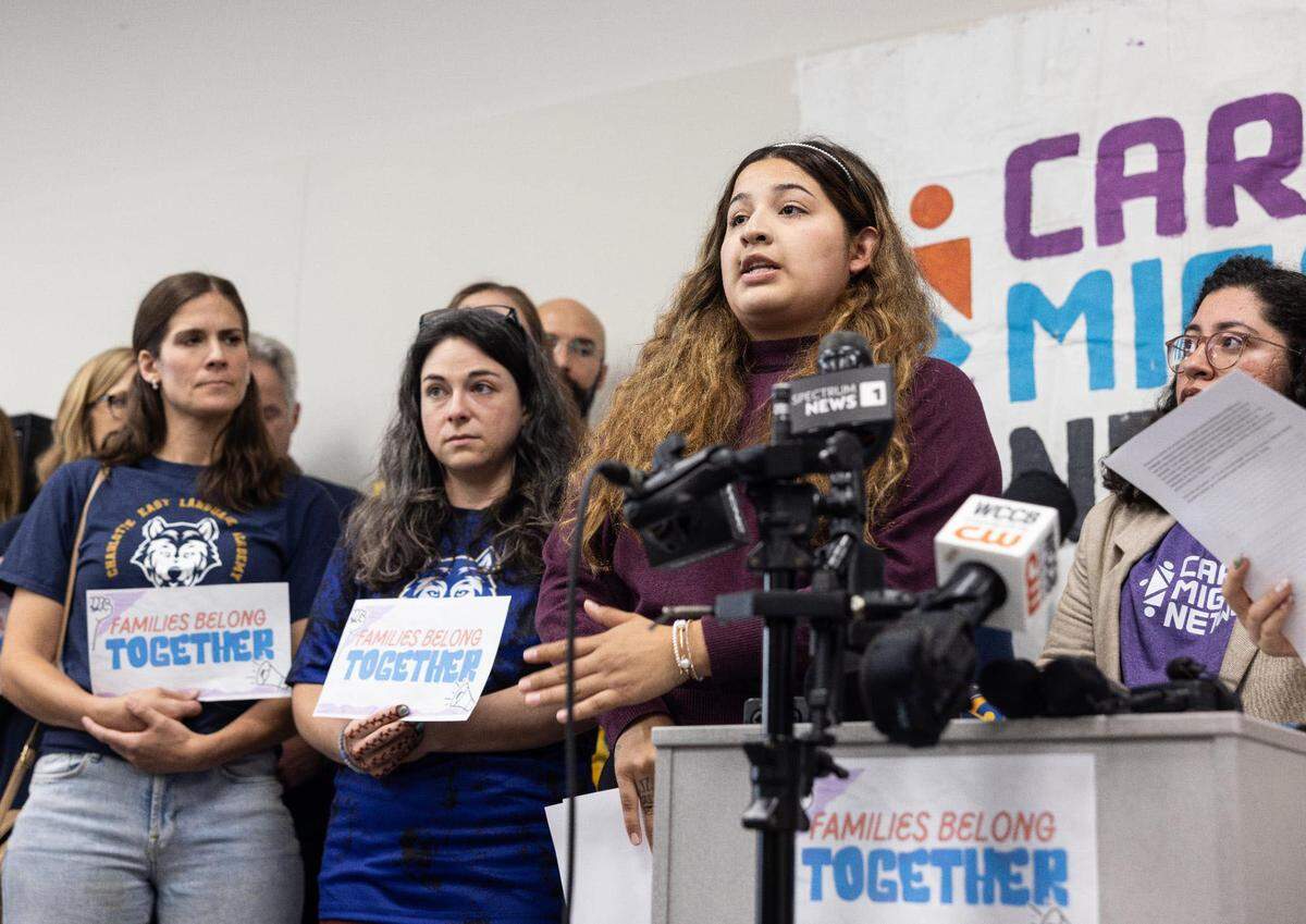Joanna Martinez talks about her father, Jose, who was detained by ICE, during a press conference in Charlotte on Monday.
