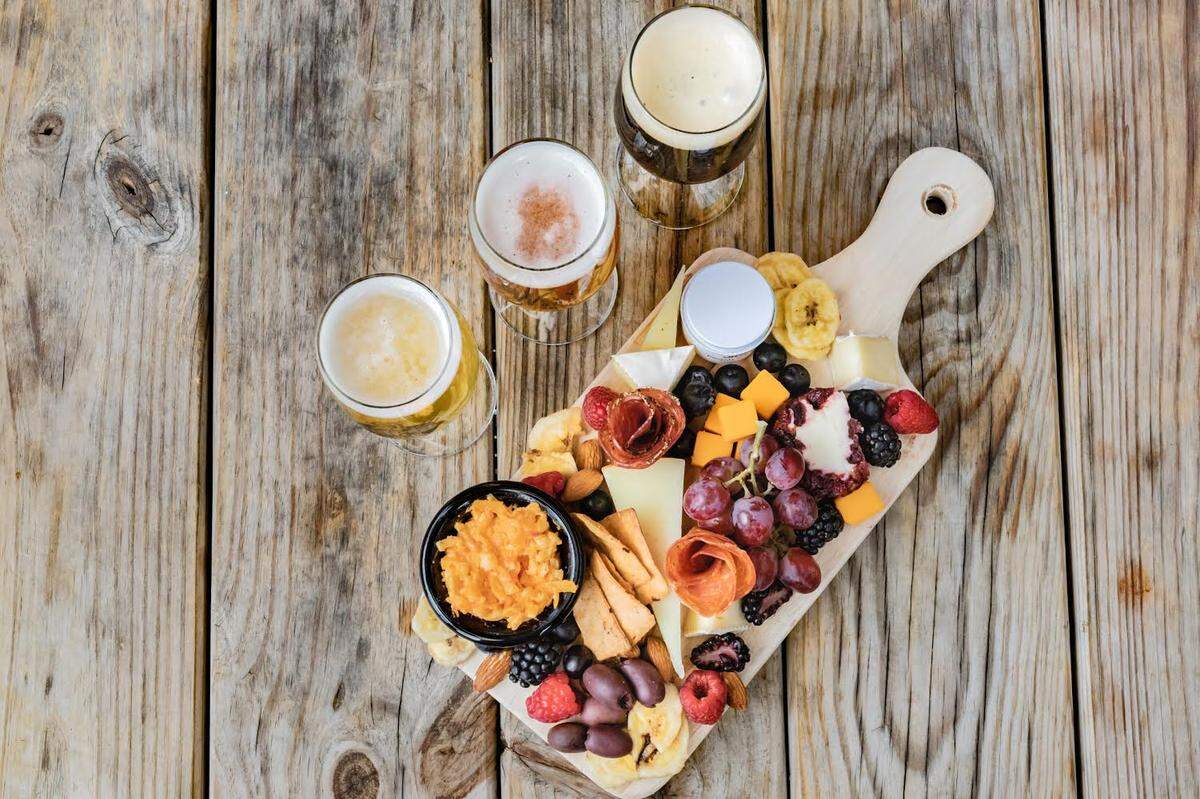 Learn to make cheese and charcuterie boards at breweries throughout the summer via Sweet Spot Summer Break.