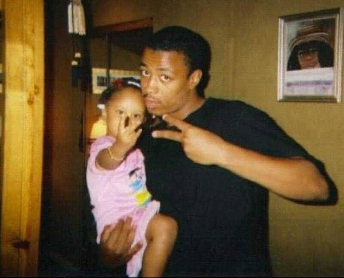 Photo of Derek Ward with his niece, Briana, before police arrested him in the 2010 murder and rape of his cousin. After 14 years in jail, awaiting trials he was repeatedly found mentally unfit to participate in, Ward is representing himself.