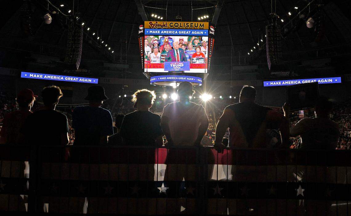 Former President Donald Trump’s supporters line the railing at Bojangles Coliseum in Charlotte, NC as the former president speaks during a campaign rally on Wednesday, July 24, 2024.
