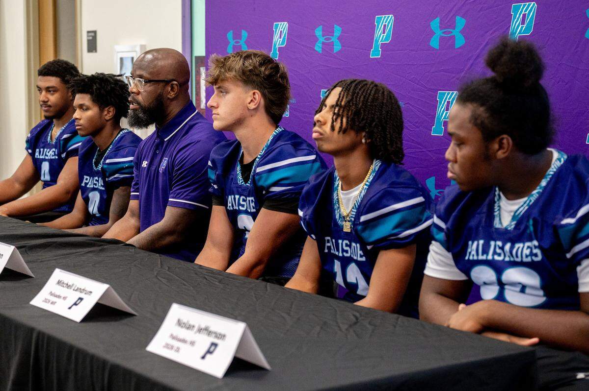 Palisades football head coach Jonathan Simmons speaks about his team and the upcoming season during the Southwestern 7A/8A high school football conference’s media day on July 29, 2025, at Rocky River High School.