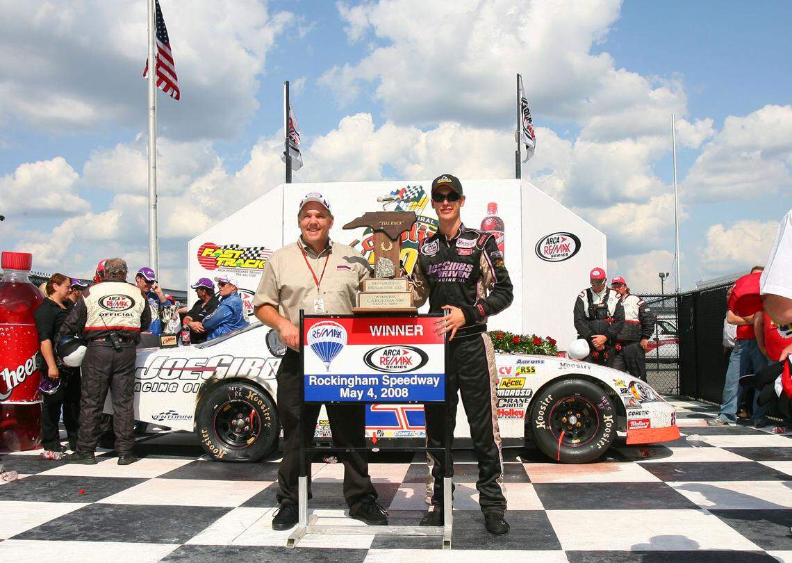 May 4, 2008; Rockingham, NC, USA; ARCA RE/MAX Series driver Joey Logano (right) with track owner Andy Hillenburg after winning the Carolina 500 at the Rockingham Speedway. Mandatory Credit: USA TODAY Sports