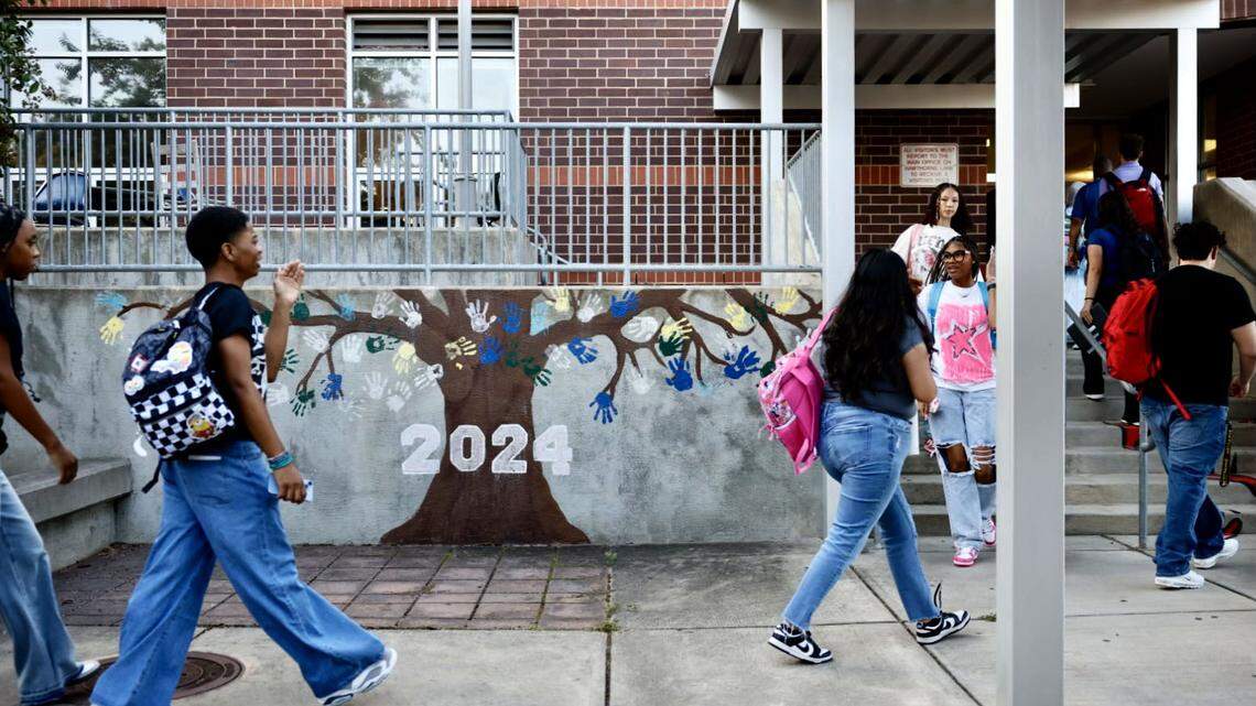 NC Democrats running in Charlotte-area legislative races say public education is among their key issues, and they want bigger raises and increased funding for public schools. In this August file photo, students walk between classes at Hawthorne Academy of Health Sciences.