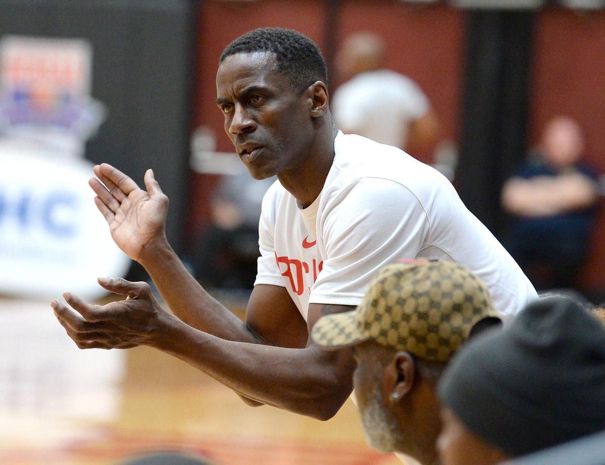 Former NBA player Vernon Maxwell cheers on his son, Tristan Maxwell, and his North Mecklenburg teammates Saturday.