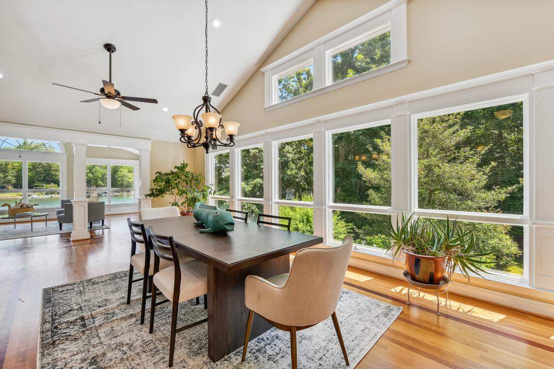 A main level breakfast area in Gary Phillips’ $2.4-million Lake Wylie, SC, home offers views of the lake from its insulated windows.