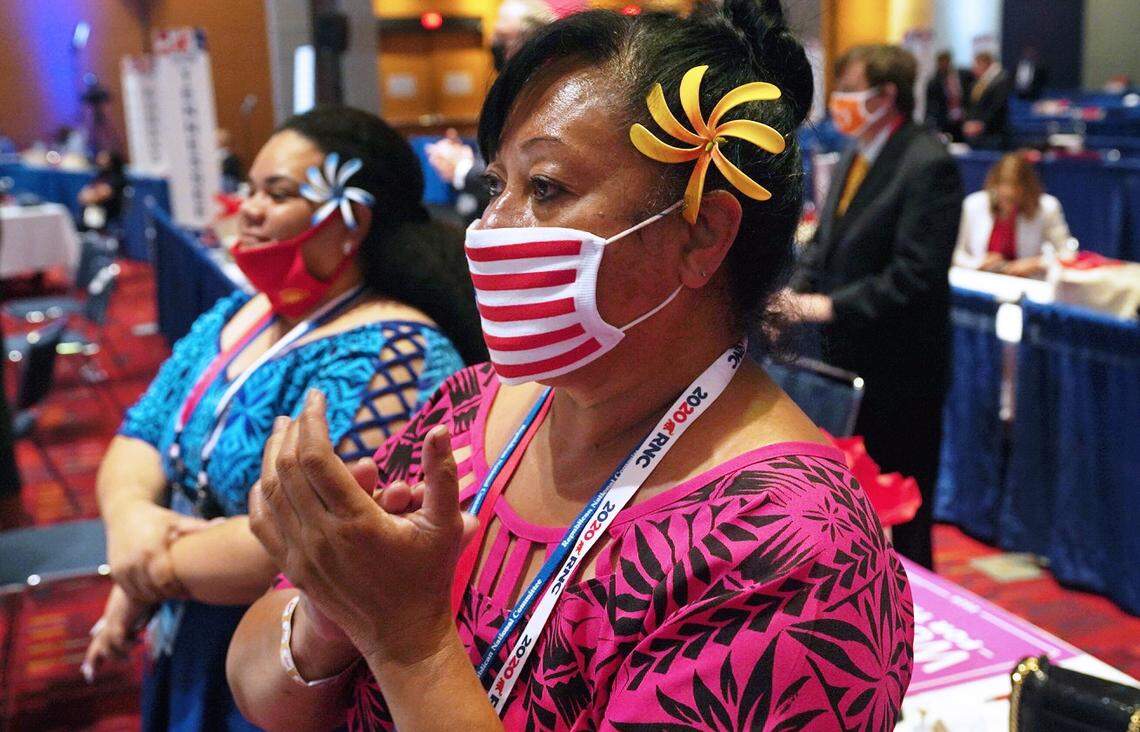 Delegates at the Republican National Convention listen to President Donald Trump speak Monday, Aug. 24, 2020 in Charlotte, N.C..