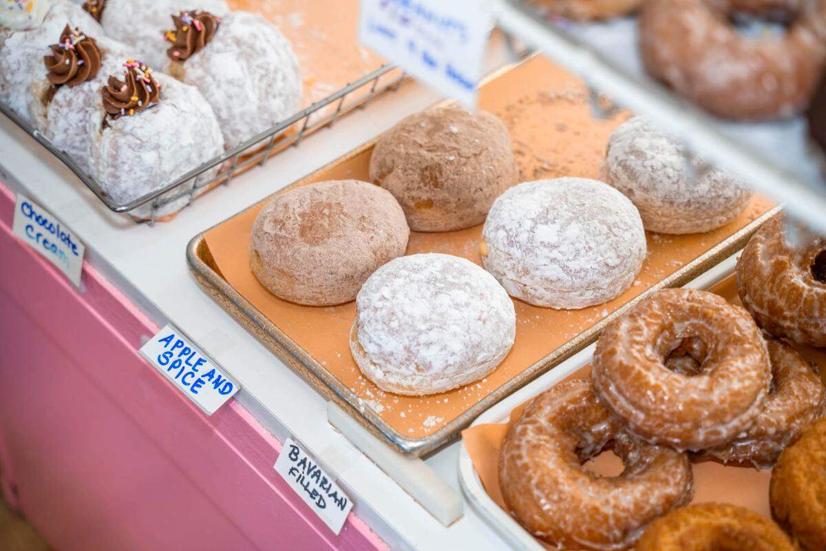 Rise & Shine Doughnut Cafe’s filled doughnuts include Apple and Spice, and Bavarian Cream.