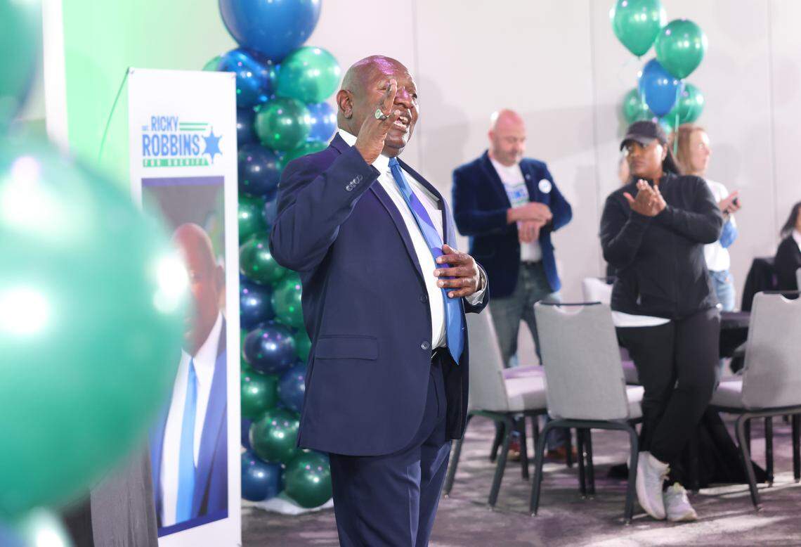 Ricky Robbins speaks to a crowd of supporters on Tuesday at Hyatt Centric during his watch party. He lost his race against Democratic Sheriff Garry McFadden.