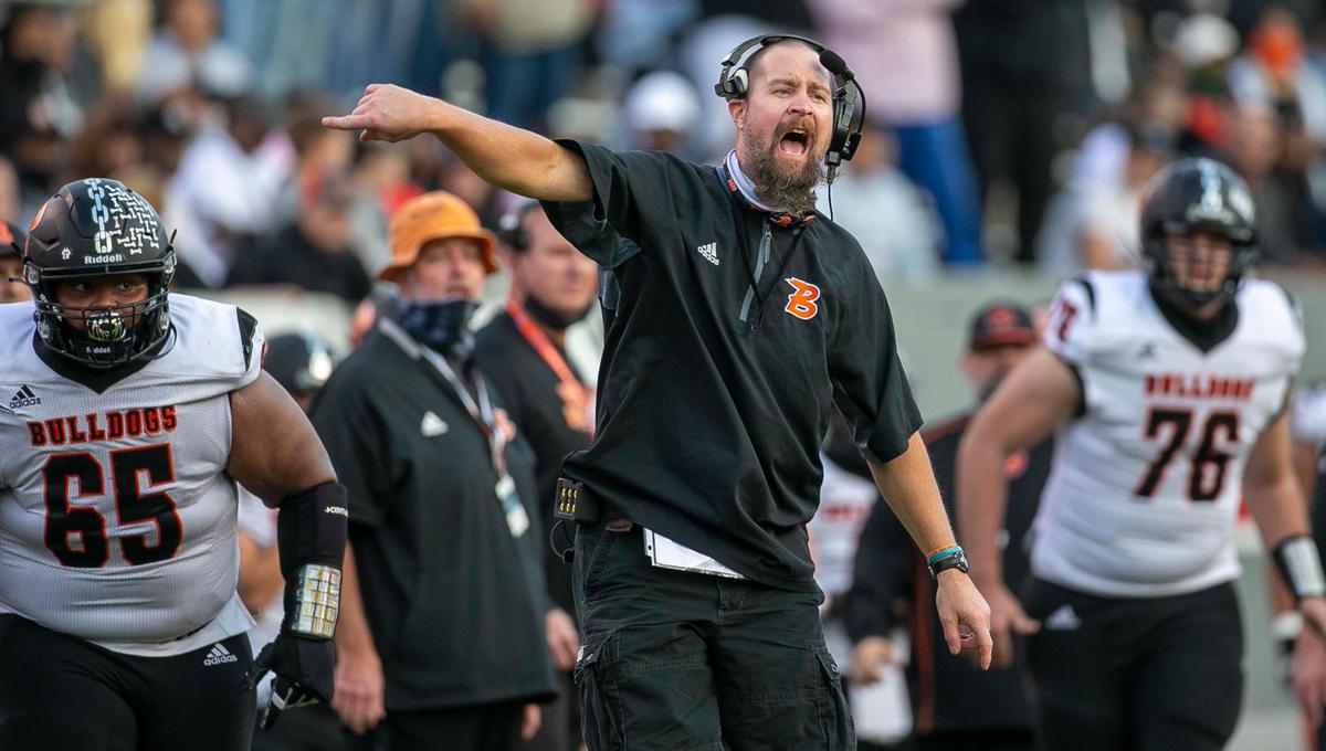 Wallace-Rose Hill coach Kevin Motsinger directs his team on defense during the second quarter against Shelby during the NCHSAA 2-A championship game on Saturday, December 11, 2021 at Carter-Finley Stadium in Raleigh, N.C.