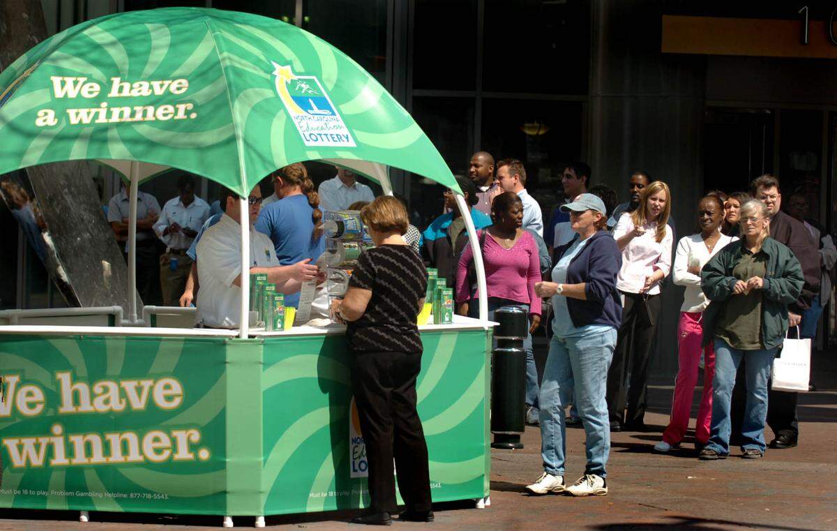 People line up to buy lottery tickets in uptown Charlotte on March 30, 2006 for the start of the North Carolina Education Lottery.