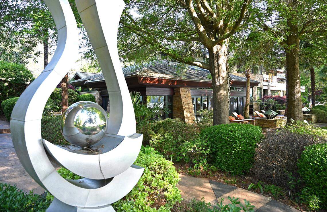 The mansion at 14051 Island Drive in Huntersville includes many indoor and outdoor architectural features.