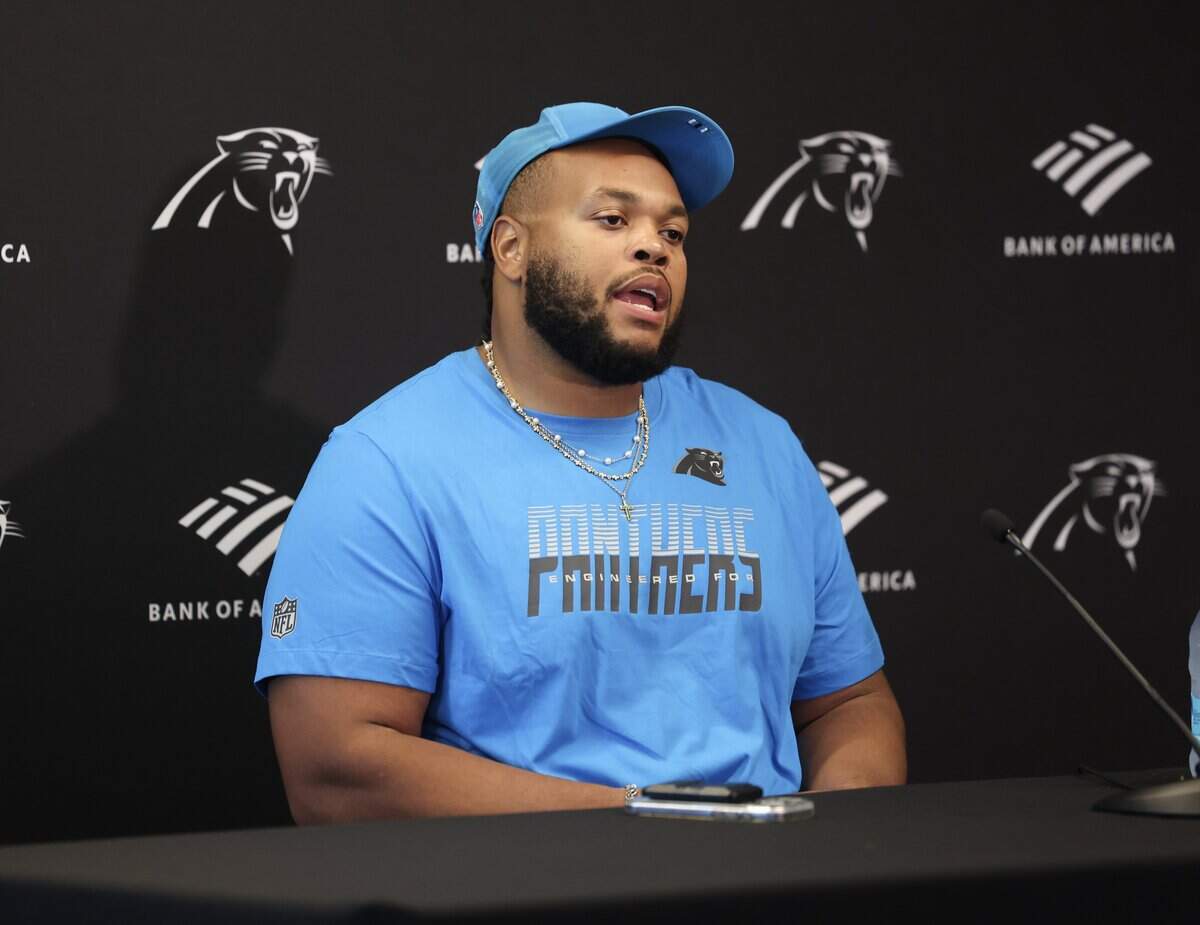Carolina Panthers offensive lineman Rob Hunt speaks with reporters at a news conference on Wednesday, July 22, 2026, at Bank of America Stadium in Charlotte.