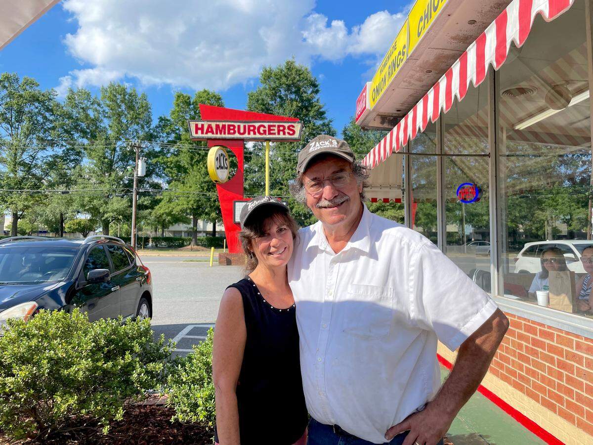 George and Elaine Demopoulos, shown here on June 23, 2021, made the decision to close Zack’s Hamburgers after 46 years.