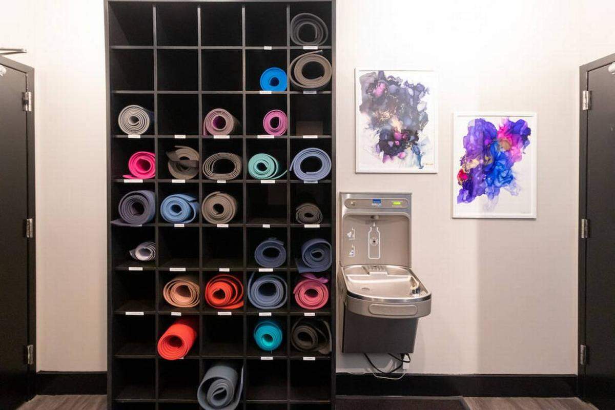 Charlotte Yoga offers mat storage for members. 