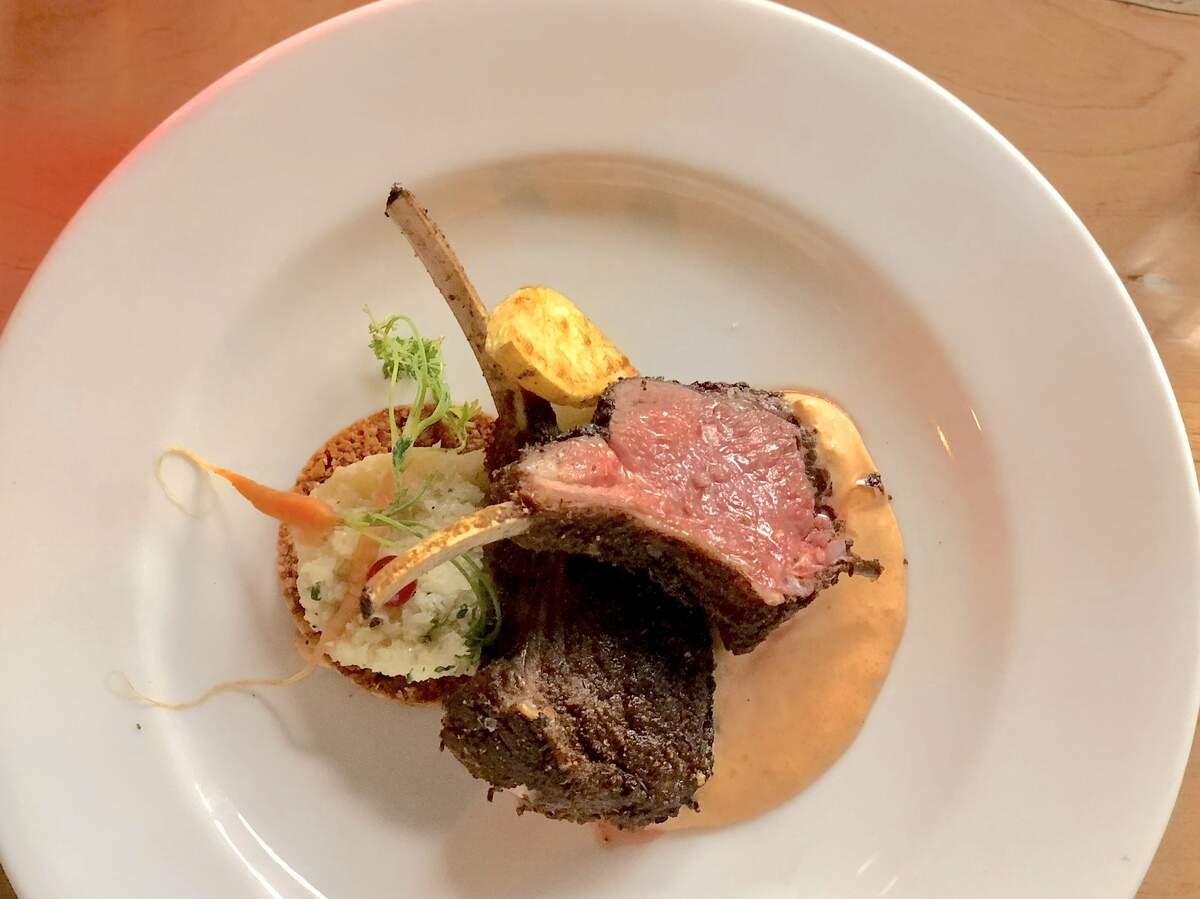 Spiced lamb lollipop with fire-roasted pepper yogurt and almond brittle won Chef Jamie Lynch immunity during a “quickfire challenge” in episode 7, season 14 of Top Chef.