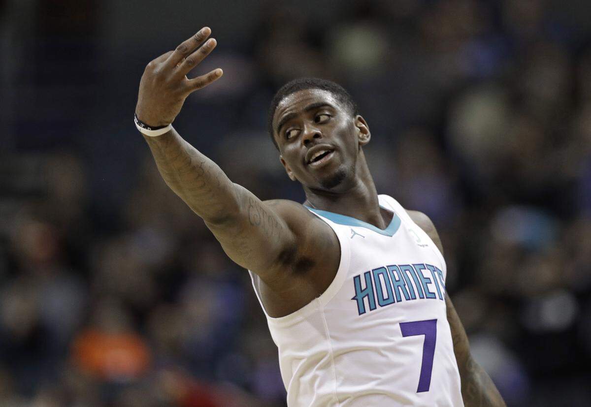 Charlotte’s Dwayne Bacon (7) reacts after making a 3-point basket during the Hornets’ overtime win against San Antonio Tuesday. After never scoring 20 points in an NBA game up until last weekend, Bacon has now done so in two straight games.