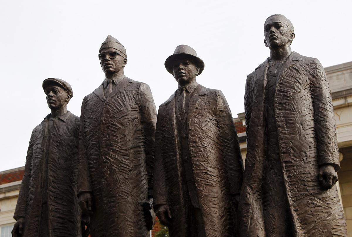 A statue of the four students who staged a civil rights sit-in at a Greensboro lunch counter in 1960 stands on the campus of N.C. A&T State University in Greensboro on Jan. 23, 2014. They are (L:R) David Richmond, Franklin McCain, Ezell Blair Jr. and Joseph McNeil.