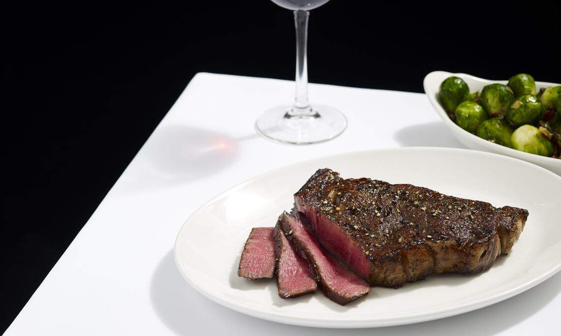 Del Frisco’s Christmas Day menu includes beef filet and Brussels sprouts with smoked bacon, caramelized onions and lemon butter.