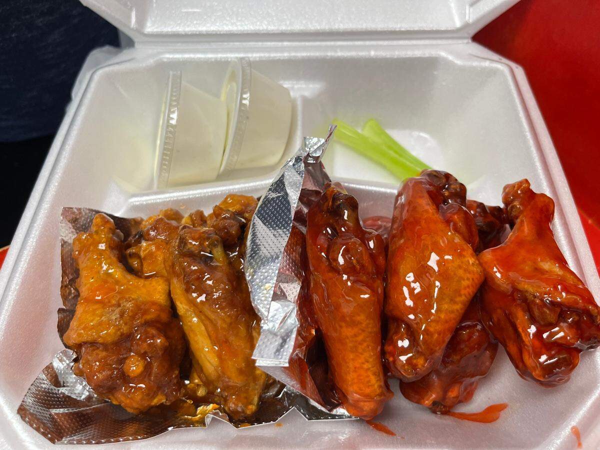 Mix Grill & Wing’s pineapple and strawberry wings carry a touch of heat.