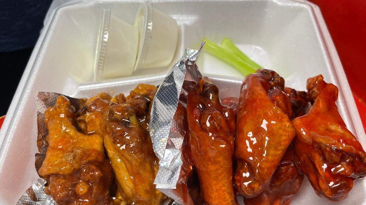 Mix Grill & Wing’s pineapple and strawberry wings carry a touch of heat.
