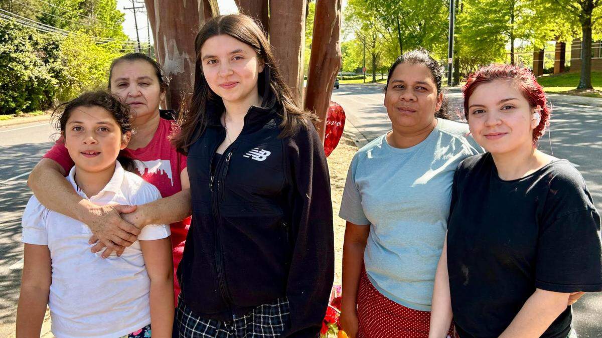 On April 10, 2023, five members of Rosalina Santos’ family placed flowers in the median of Park Road to honor the memory of the 49-year-old Charlotte grandmother who was killed in a car crash six days earlier. From left to right: Jeilan Lopez, Maria Santos, Keily Santos, Reyna Rodriguez and Ashley Santos.