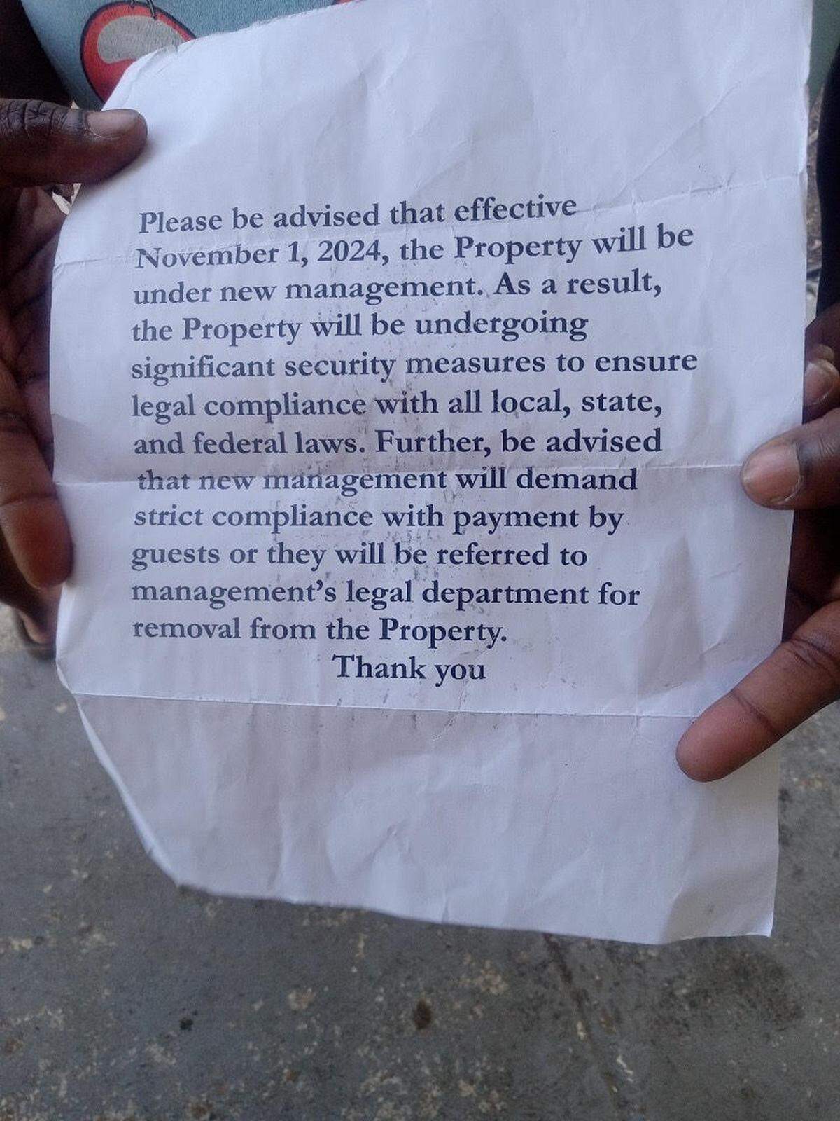 Tenants at the Lamplighter Inn say they recently found this anonymous note taped to their doors saying new management would be taking over the property. But it’s not clear who owns and is managing the hotel.