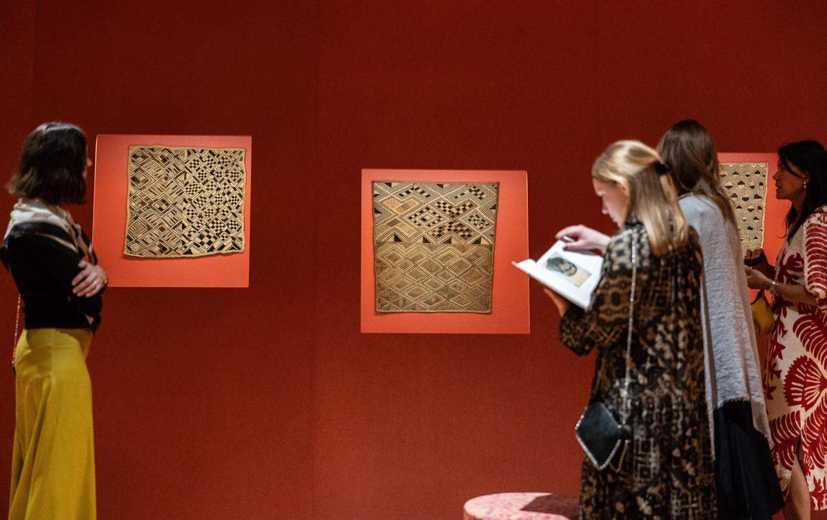 People look a the "Designing Dynamism: Kuba Textiles from the DR Congo, The Wesley Mancini Collection," at the Mint Museum Randolph in Charlotte, N.C., on Thursday, February 19, 2026.
