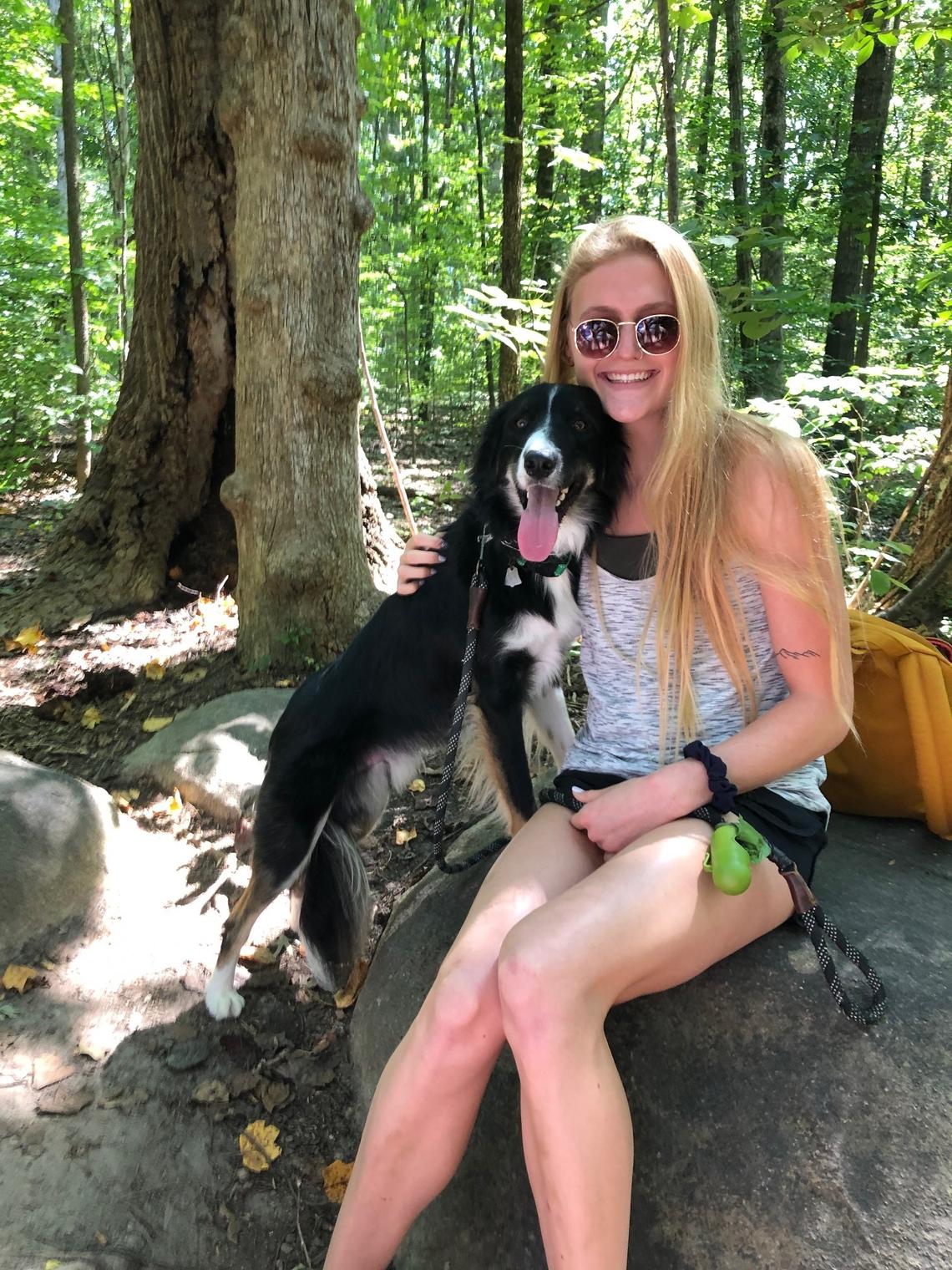 Sinclair Larson with her dog Jasper in a family photo taken earlier this year.