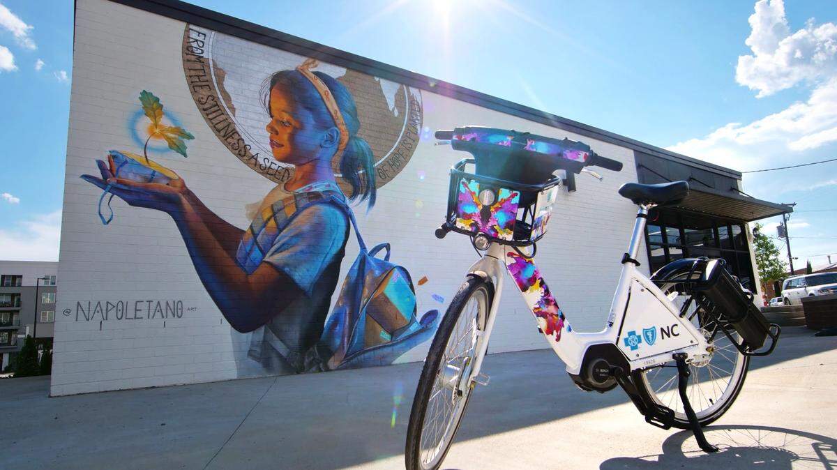 Nearly 250 new electric bikes designed by Charlotte artists including Nick Napoletano are hitting the streets.