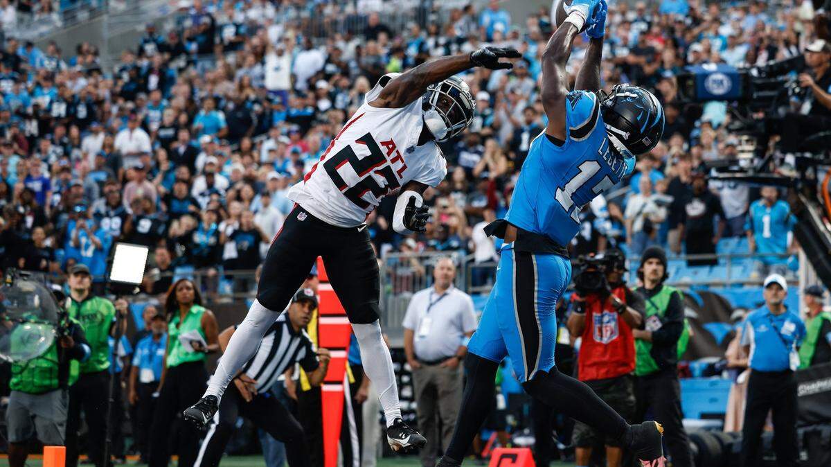 Panthers wide receiver Xavier Legette catches a pass for a touchdown during the game against the Falcons at Bank of America Stadium in Charlotte, NC on Sunday, Oct. 13, 2024.